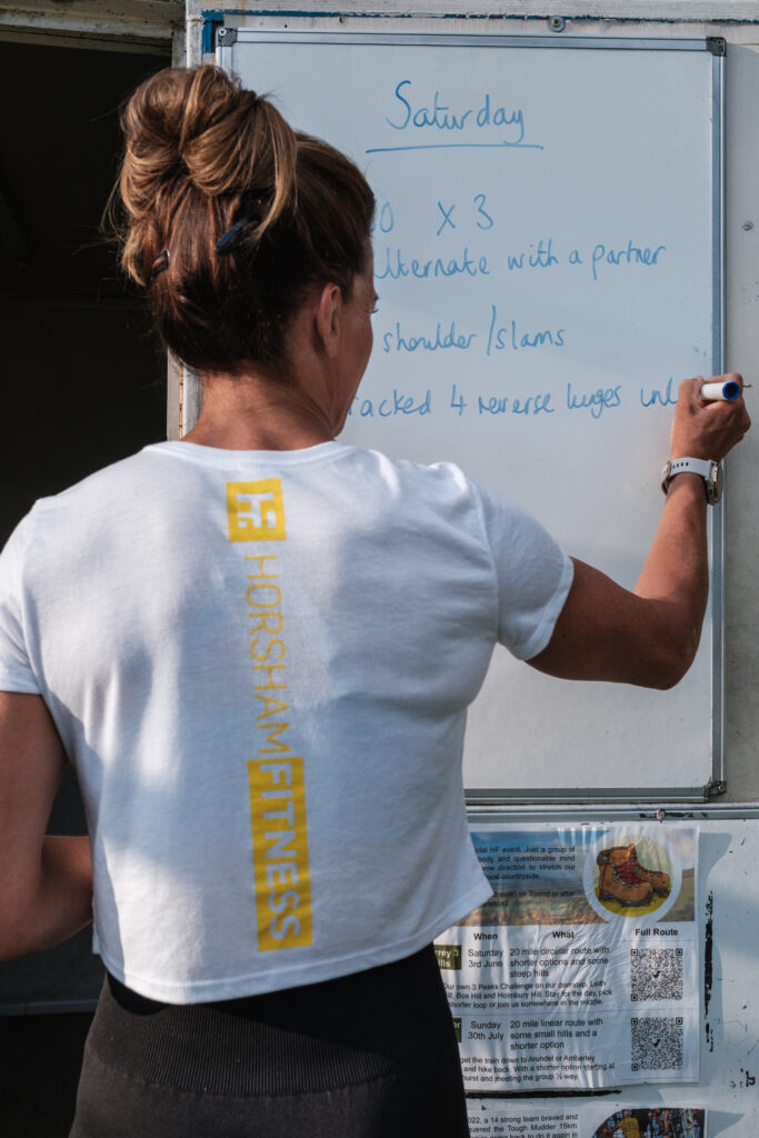coach writing our workout